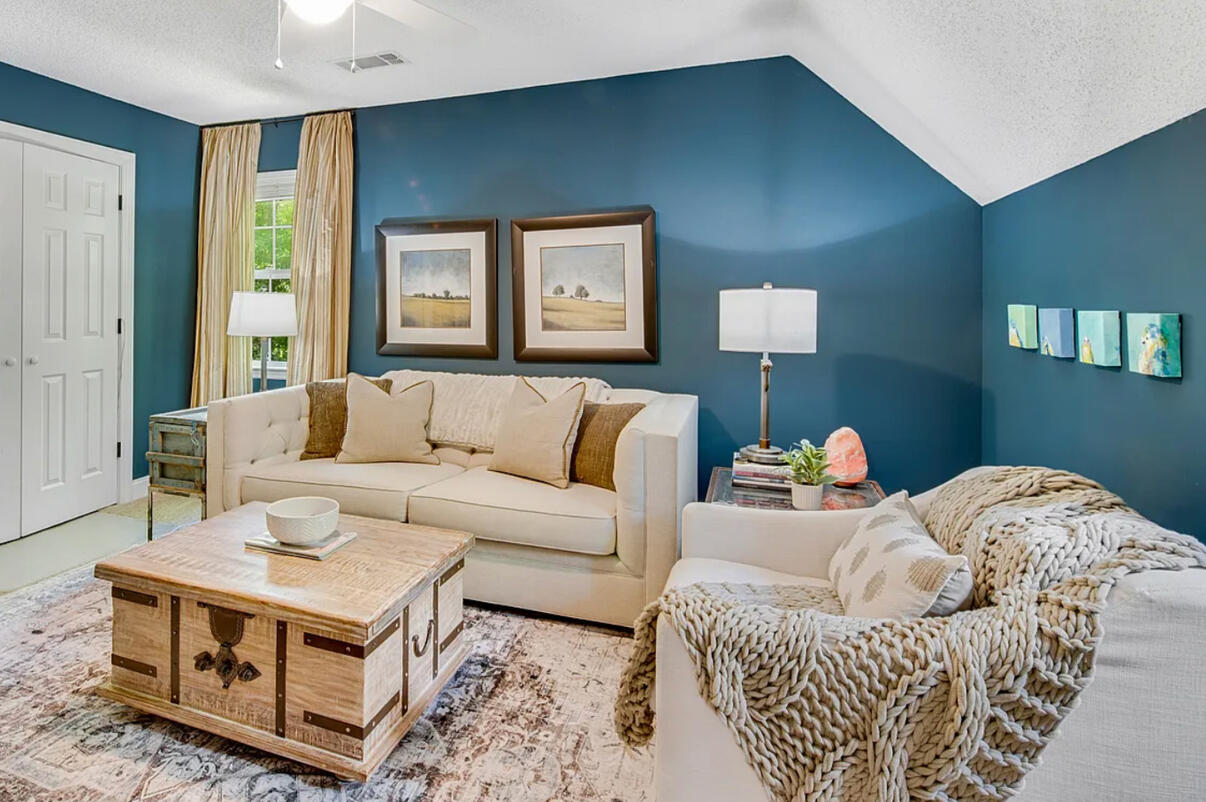 Media Room Makeover. The room was a blank slate and the client had an open mind. Instead of neutral color walls & pop of color pillows, we went the opposite and it turned out fabulous.